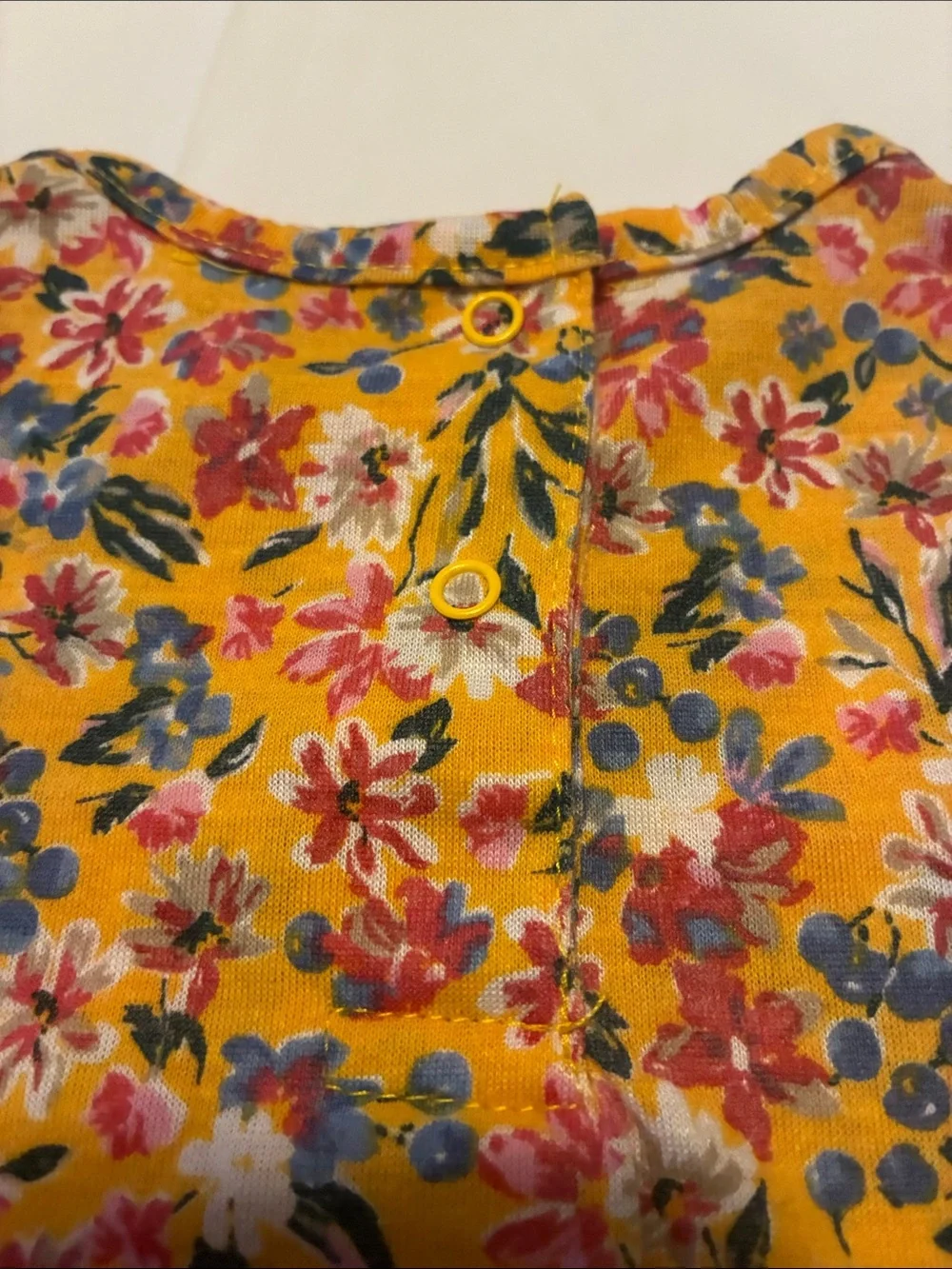 BCBG Girls Yellow Floral Baby Romper with Pink & Blue Accents